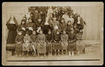 Photograph of 20 American Indian girls and 3 nuns