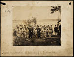 Photograph of 29 American Indian boys and 2 priests, possible Fr. Eugene Chirouse and Fr. Paul Durieu.